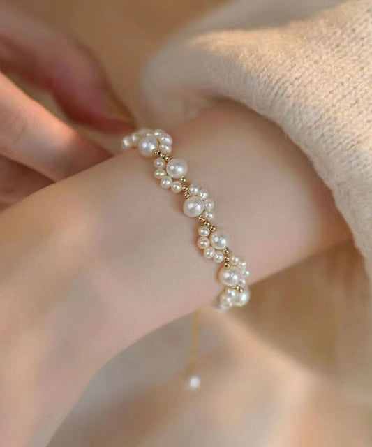 Elegant White Alloy Bracelet – Pearls & Cat Claw Design
